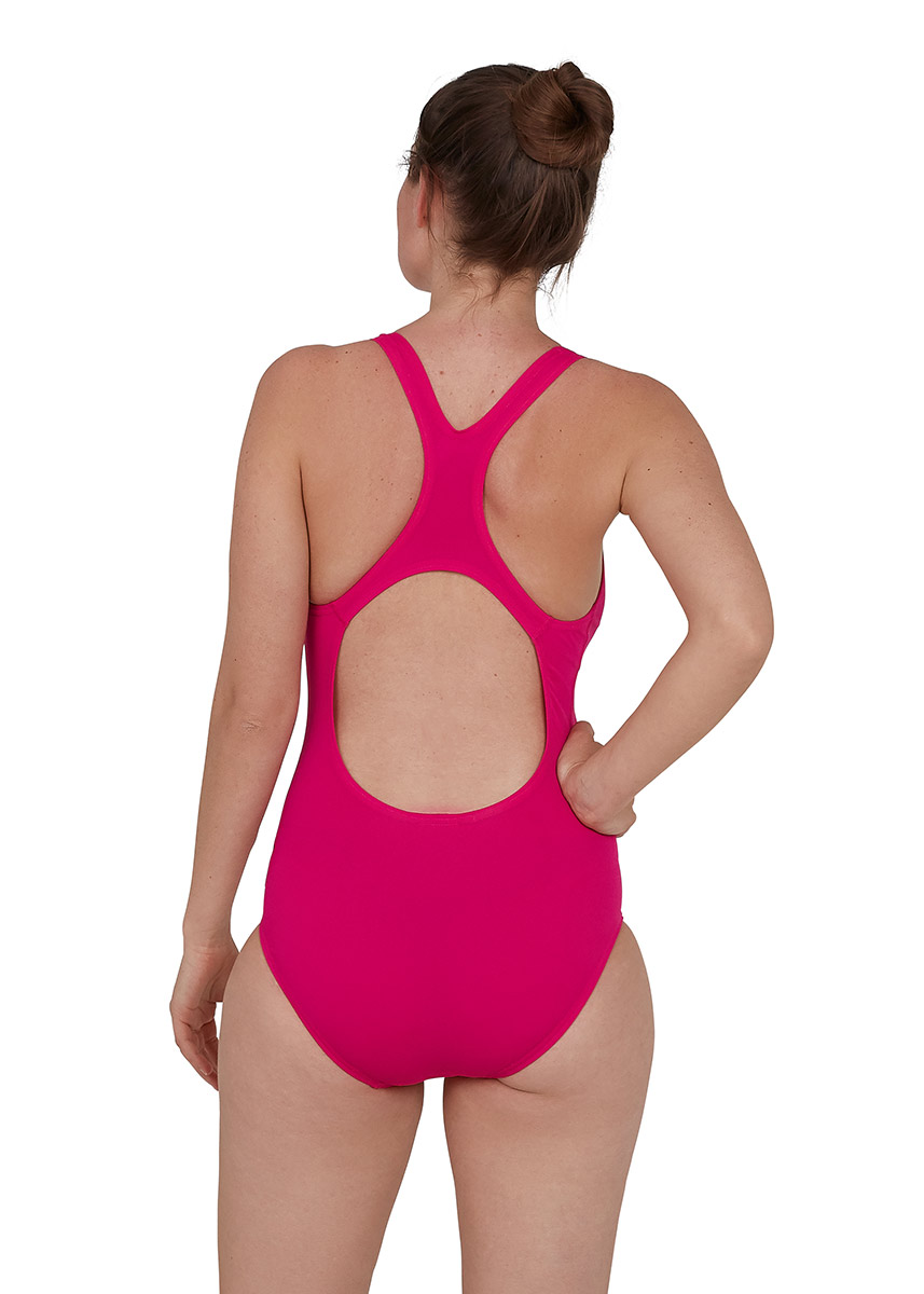 Front view of woman wearing Speedo Women's Essential Endurance+ Medalist Swimsuit - Electric Pink